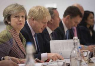 Theresa May slams Trump travel ban, terms it... Theresa May slams Trump travel ban, terms it...