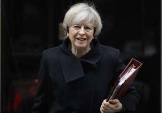 May leaves 10 Downing Street in London to attend... May leaves 10 Downing Street in London to attend...