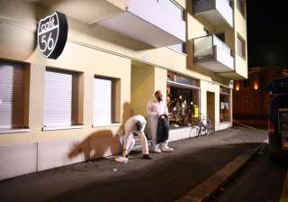 A forensic team investigates after deadly gunfire... A forensic team investigates after deadly gunfire...