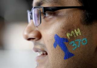 File pic - A man with a painted face attend Day... File pic - A man with a painted face attend Day...