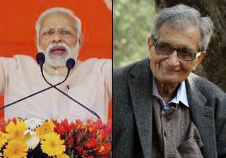 Modi takes a veiled dig at Amartya Sen on note... Modi takes a veiled dig at Amartya Sen on note...