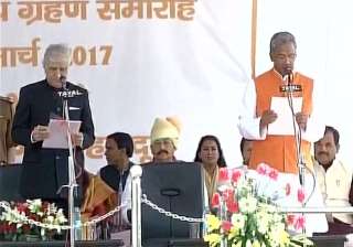 Trivendra Singh Rawat sworn in as CM of... Trivendra Singh Rawat sworn in as CM of...