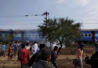 Smoke erupts from a bogie after a blast in the... Smoke erupts from a bogie after a blast in the...