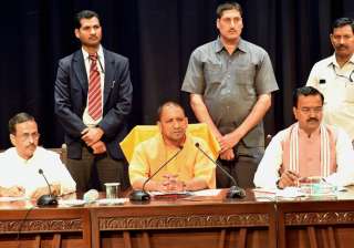 UP CM Yogi Adityanath allots portfolios to his... UP CM Yogi Adityanath allots portfolios to his...