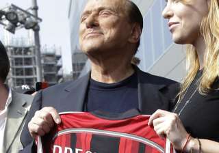 Silvio Berlusconi sells AC Milan to... Silvio Berlusconi sells AC Milan to...