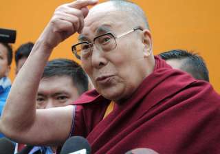 Dalai Lama interacting with media after a... Dalai Lama interacting with media after a...