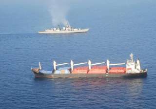 INS Mumbai with the MV OS 35 that was attacked by... INS Mumbai with the MV OS 35 that was attacked by...