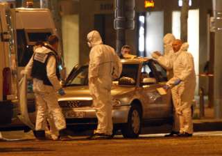 Paris attack: Gunman kills cop before being shot... Paris attack: Gunman kills cop before being shot...