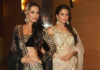 Malaika and Amrita sizzles in this magazine cover... Malaika and Amrita sizzles in this magazine cover...