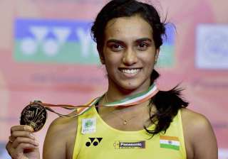Sindhu poses with her medal after winning final... Sindhu poses with her medal after winning final...