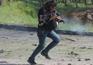 When a Syrian photographer put down his camera to... When a Syrian photographer put down his camera to...