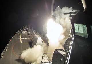 USS Ross (DDG 71) fires a tomahawk land attack... USS Ross (DDG 71) fires a tomahawk land attack...
