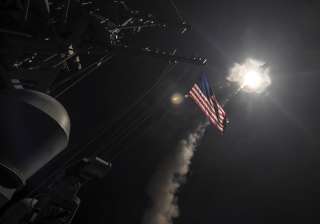 US blasted a Syrian air base with a barrage of... US blasted a Syrian air base with a barrage of...