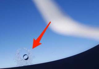 Do you know why airplane windows have tiny holes? - India TV Do you know why airplane windows have tiny holes? - India TV