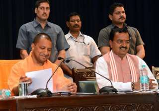 File pic of CM Yogi and his Deputy at a... File pic of CM Yogi and his Deputy at a...