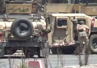Gunmen storm state broadcaster's compound in... Gunmen storm state broadcaster's compound in...