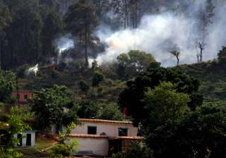 Smoke after a mortar shell was fired by Pakistan... Smoke after a mortar shell was fired by Pakistan...