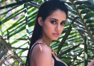 Disha Patani turns up the heat in latest bikini... Disha Patani turns up the heat in latest bikini...