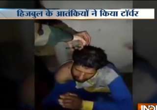 Video shows suspected Hizbul militants torturing,... Video shows suspected Hizbul militants torturing,...