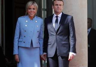 French President Emmanuel Macron poses for... French President Emmanuel Macron poses for...