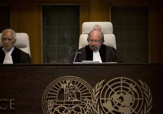 Presiding judge Ronny Abraham of France reads the... Presiding judge Ronny Abraham of France reads the...