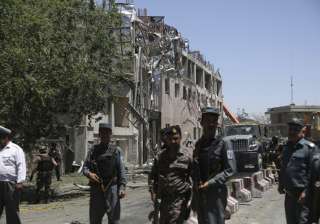Security forces near the site of a suicide attack... Security forces near the site of a suicide attack...