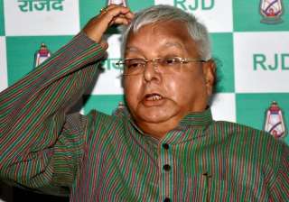 Lalu addressing a press conference at his... Lalu addressing a press conference at his...