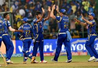 MI players celebrate during an IPL match in... MI players celebrate during an IPL match in...