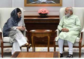 File pic of Mehbooba Mufti and Narendra Modi -... File pic of Mehbooba Mufti and Narendra Modi -...