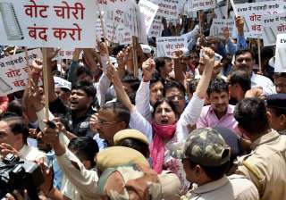 AAP workers protest outside EC officer over... AAP workers protest outside EC officer over...