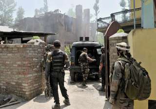 Army personnel outside the house where Sabzar... Army personnel outside the house where Sabzar...