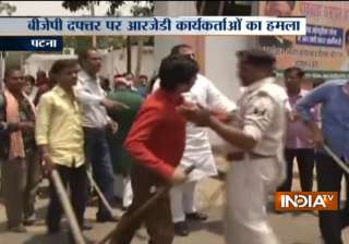 After I-T raids on Lalu Yadav, RJD workers attack... After I-T raids on Lalu Yadav, RJD workers attack...