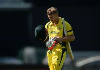 Australian opener David Warner walks off the... Australian opener David Warner walks off the...