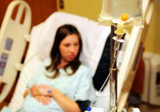 pregnant woman denied wheelchair - India TV pregnant woman denied wheelchair - India TV