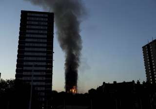 At least 6 dead as massive fire engulfs London's... At least 6 dead as massive fire engulfs London's...