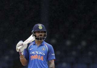 Virat Kohli reacts after rain stopped play at the... Virat Kohli reacts after rain stopped play at the...