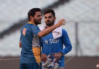 A file image of Shahid Afridi and Virat Kohli. -... A file image of Shahid Afridi and Virat Kohli. -...