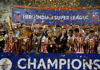 Atletico de Kolkata players celebrate with the... Atletico de Kolkata players celebrate with the...