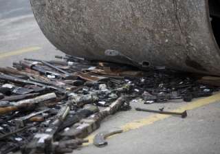 Brazil destroys over 4,000 guns seized from... Brazil destroys over 4,000 guns seized from...