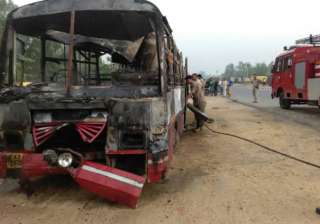 22 charred to death after bus collides with truck... 22 charred to death after bus collides with truck...