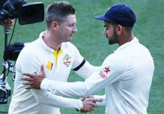 A file image of Michael Clarke and Virat Kohli. -... A file image of Michael Clarke and Virat Kohli. -...