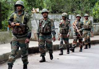 Army personnel patrol a street in Darjeeling -... Army personnel patrol a street in Darjeeling -...