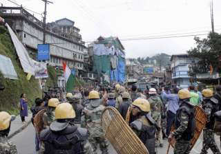 Security personnel during a protest by GJM in... Security personnel during a protest by GJM in...