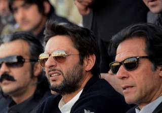 A file image of Imran Khan and Shahid Afridi. -... A file image of Imran Khan and Shahid Afridi. -...