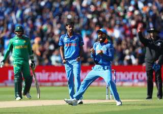 Virat Kohli celebrates the dismissal of a... Virat Kohli celebrates the dismissal of a...