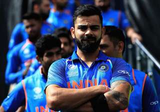 Virat Kohli in action during the game against... Virat Kohli in action during the game against...