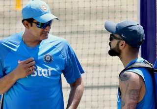 Anil Kumble and Virat Kohli interact during... Anil Kumble and Virat Kohli interact during...