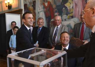 Macron after casting his ballot in French... Macron after casting his ballot in French...