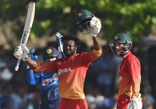 Solomon Mire celebrates after his century. -... Solomon Mire celebrates after his century. -...