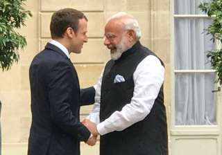 PM Modi meets French President Emmanuel Macron in... PM Modi meets French President Emmanuel Macron in...